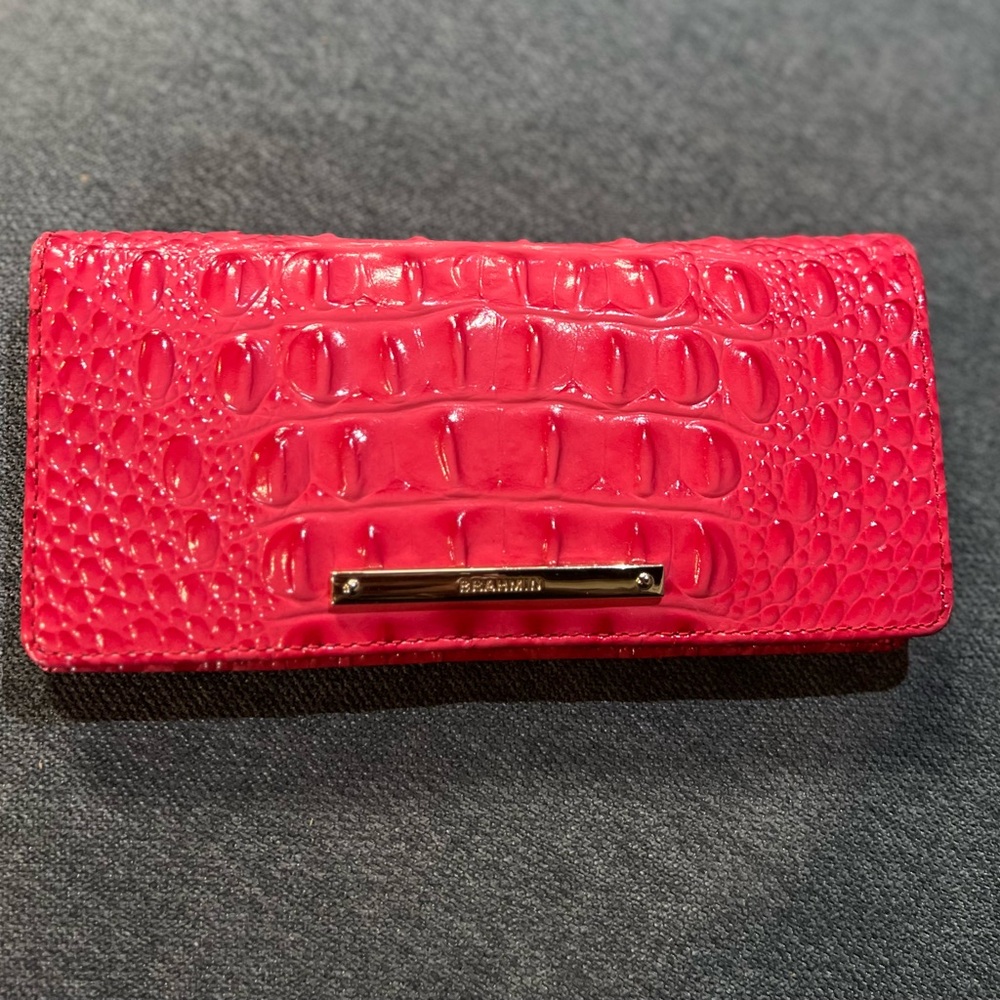 Pink BRAHMIN leather wallet. 15 card slots, cash slot, and coin zippered section